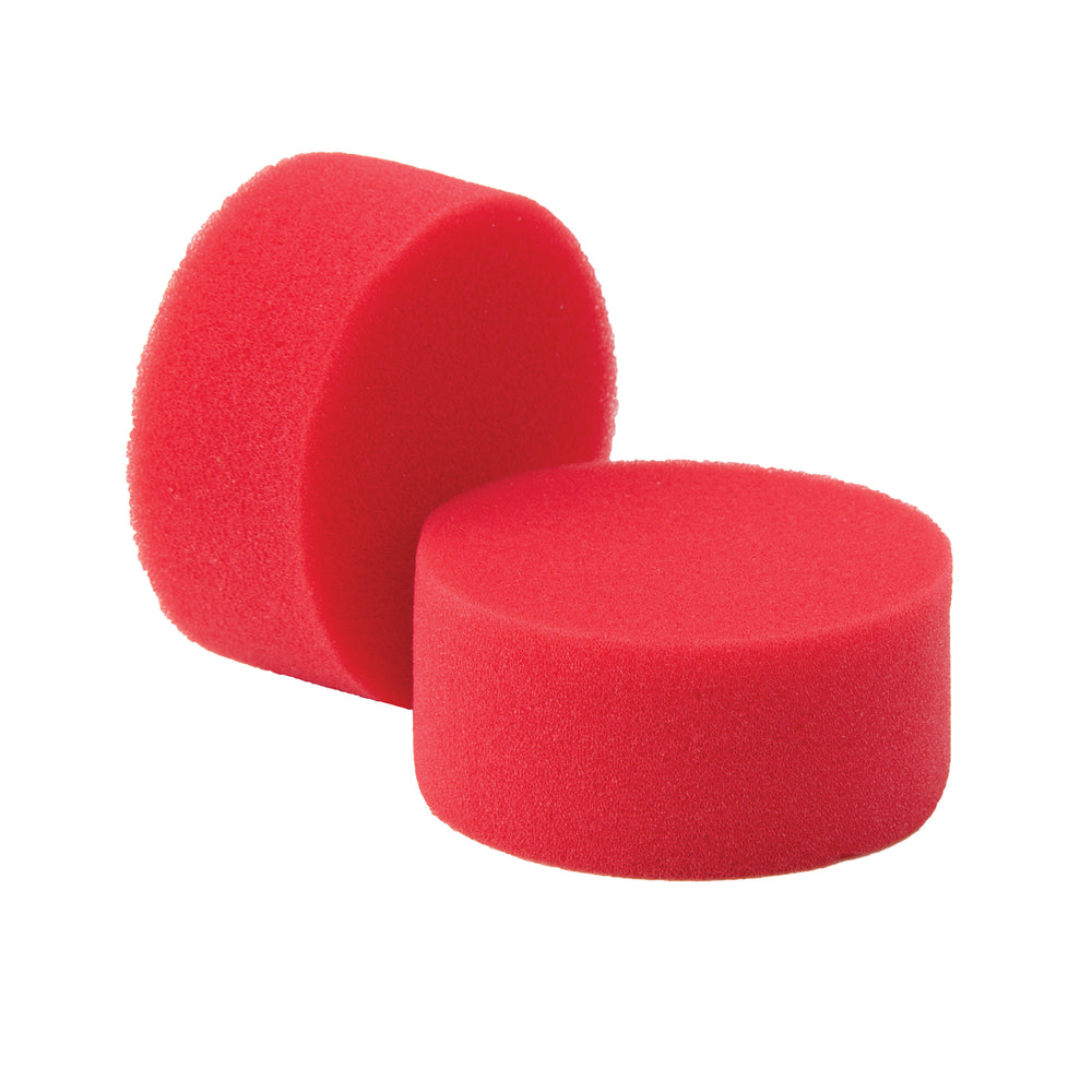 A pair of red polyurethane sponges